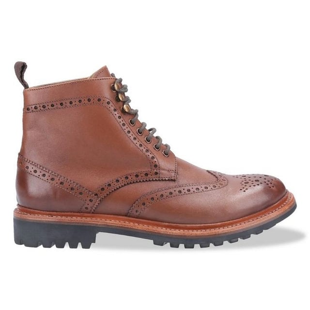 Classic wing-tip brogue detailing. Single line stitching. Chunky outsole unit. Rear loop for easy pull on. 5 eyelet and 3 top lace hooks for an adjustable fit.