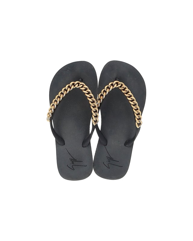 VINTAGE, RRP AS NEW
Experience luxury and style with the Giuseppe Zanotti Chain Hollywood Slides in Black Rubber. These slides offer a perfect blend of comfort and elegance, crafted with high-quality black rubber that feels great against the skin. The standout feature of these slides is the chain detail on the vamp, which adds a touch of sophistication and glamour to the overall design. 
*with box

Giuseppe Zanotti Chain Hollywood Slides in Black Rubber
Color: Black
Material: Rubber
Condition: Very good
Size: EU34
Sign of wear: Light wear throughout
SKU: 365173 / TONPUGBSH365173W