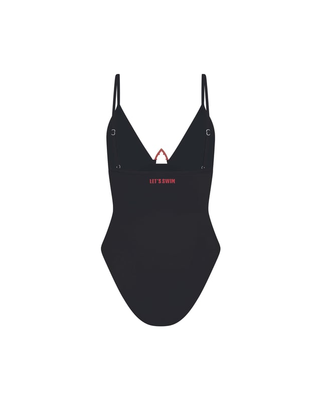 Starring a triangle top design with a signature shark tooth hardware to the chest, this swimsuit brings style and drama. Finished with a high-rise fit and adjustable straps, it’s the perfect piece for soaking up the sun in style.