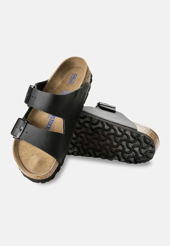 Birkenstock Arizona Sfb Enge Passform Schwarz 551253 "Das oft imitierte, nie kopierte, kategoriebestimmende Zwei-Riemen-Wunder von Birkenstock. Eine Komfort-Legende und ein modisches Grundnahrungsmittel. Mit verstellbaren Riemen und einem magischen Korkfußbett, das sich der Form Ihres Fußes anpasst, ist eine wirklich individuelle Passform so mühelos wie das klassische Design.
,Hergestellt in Deutschland
,Absatzform: flach
,Birko-Flor - strapazierfähiges, synthetisches Obermaterial mit lederähnlicher Oberfläche und weicher Unterseite
,Fußbett aus Kork passt sich der Form Ihres Fußes an und verfügt über eine ausgeprägte Fußgewölbestütze, eine tiefe Fersenkappe und einen geräumigen Zehenraum; mit Wildleder gefüttert
Leichte EVA-Sohle für Dämpfung und Stoßabsorption
,Vermeiden Sie extreme Hitze
"