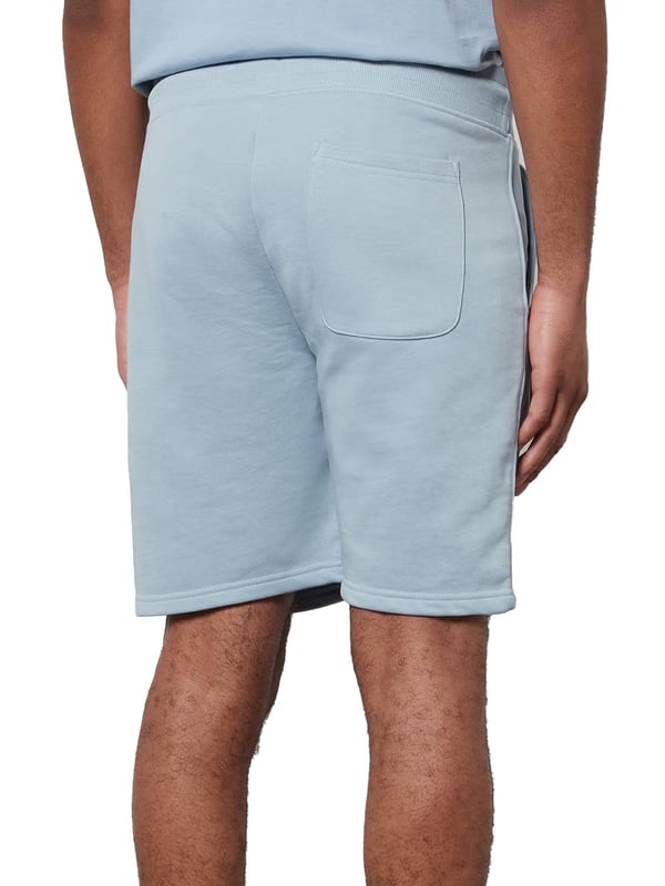 These classic sweat shorts are crafted from a soft cotton blend and tailored for a regular fit. Featuring a ribbed waistband for enhanced comfort, the design includes two front pockets, a single back pocket, and a drawstring waist. Completing the look, the shorts are adorned with a small-scale shield graphic embroidered on the left leg.