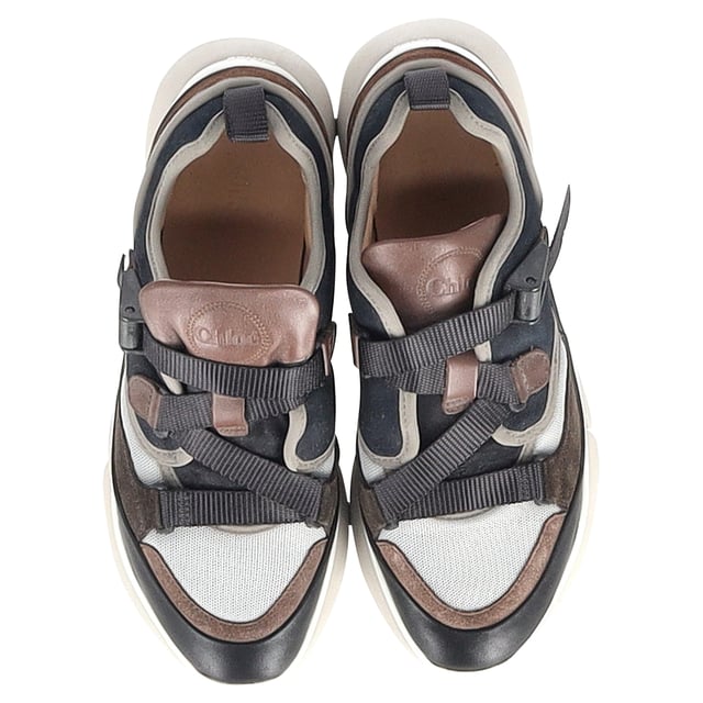 VINTAGE, RRP AS NEW
Step into a world of vibrant style with the Chloé Sonnie Low-Top Sneakers in Multicolor Leather. Featuring a striking blend of colors and textures, these sneakers make a bold statement while maintaining an elegant silhouette. Crafted from premium leather, they offer both comfort and sophistication, perfect for adding a touch of playful luxury to any outfit.

Chloé Sonnie Low-Top Sneakers in Multicolor Leather

Condition: Very good
Signs of wear: No Mark at insole.,  Very light mark at soles.
Packaging: None
Color: Brown 
Material: Leather 
Size: EU37/US7/UK4
Measurements: Heel height: 40; Insole length: 280
SKU: TONPUGBSH375883W
