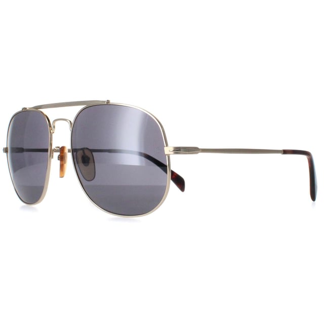 David Beckham Aviator Mens Gold Silver DB7004/S  Sunglasses are a stylish and modern accessory that offers both fashion and function. With a sleek and minimalist aviator design, these sunglasses are the perfect addition to any outfit, whether you're dressing up for a special occasion or keeping it casual on a sunny day. The adjustable nose pads and temple tips ensure a comfortable and secure fit, making these sunglasses suitable for all face shapes. Whether you're going for a run, hitting the beach, or just spending time outside, these sunglasses will keep you looking sharp and feeling confident.