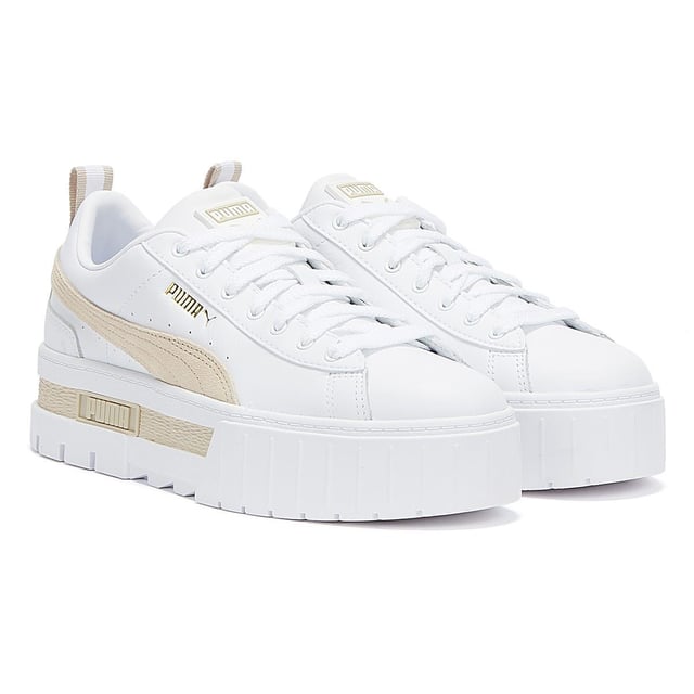 PRODUCT STORY : We made this one for the hype girls, street enthusiasts and trend mavens - basically for those who want to stand out with sophisticated swagger. Taking design elements from the urban environment and injecting them with extra edge, the Mayze encompasses attitude. Crisp and clean, with a luxurious leather upper, sleek suede overlays, eye-catching colour contrasting and a seriously stacked sole, these trend-setting trainers will be the envy of every onlooker. DETAILS : Leather upper with suede and synthetic overlays Glossy eyelets Elevated rubber midsole with textured tooling Rubber outsole Lace closure for a snug fit PUMA branding at tongue Foil-printed PUMA No.2 Logo at quarter PUMA Formstrip at medial and lateral sides PUMA Wordmark at tooling Foil-printed PUMA Cat Logo at heel