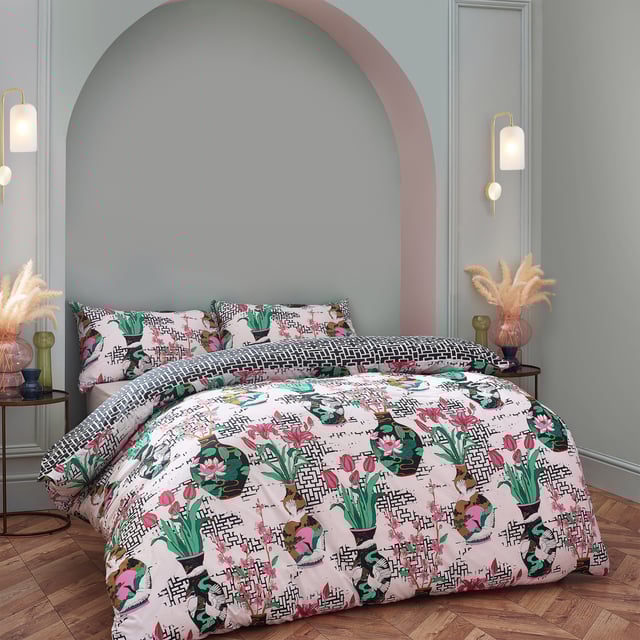 Inspired by Japanese geometric patterns, the injections of colour from the flowers and vases alongside the contrasting geometric monochrome design create a striking and fantastic centrepiece for your bedroom.