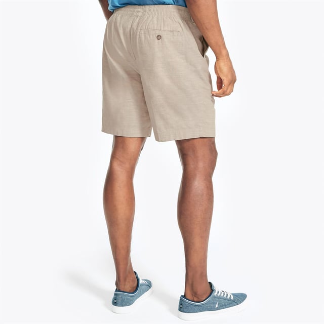 Your 'go to' summer shorts featuring a comfortable elastic-drawstring waist Multiple pockets to keep your necessities close and secure. Nautica logo embroidered above back welt pocket Fit: Relaxed, Sizing: As expected