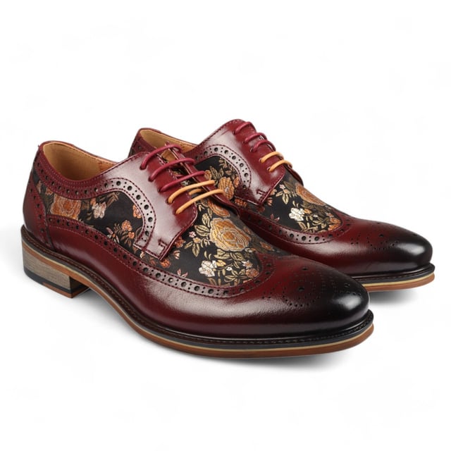 Add a unique touch to your formal wardrobe with the Ross Men's Floral Print Leather Brogue Shoes. Crafted from 100% premium leather, these brogues combine style, durability, and comfort. Featuring classic brogue detailing with decorative patterns, they bring elegance and sophistication to any look.

Unique Floral Print for a bold, stylish statement
Premium Leather for durability and luxury
Classic Brogue Detailing for timeless appeal
Lace-Up Design for an adjustable fit