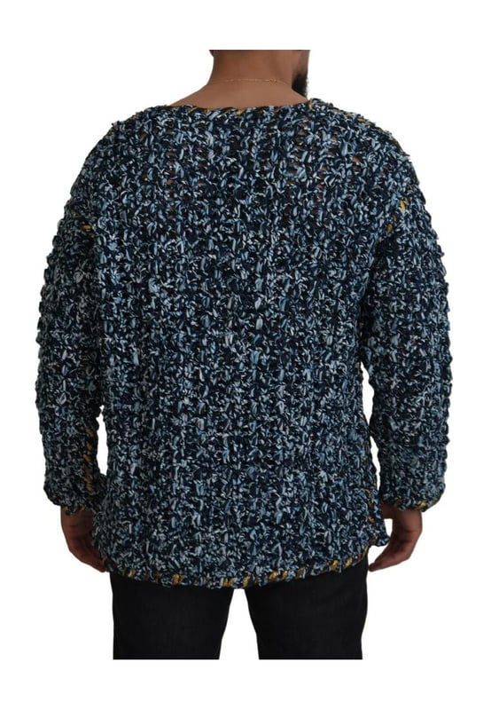 Cardigan Azul Botón Hecho A Mano Suéter  
marca DOLCE & GABBANA  
Hecho en Italia  
Color azul con logo dorado  
Diseño elegante y lujoso  
Prenda versátil para looks casuales o más arreglados  
Cómodo y de calidad  
Perfecto para combinar con jeans o pantalones  
Agrega elegancia a cualquier conjunto  
Material: 5% Elastano 10% PA 65% PL 10% VI 10% Cuero