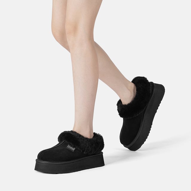 Stay snug and stylish in the timeless Topknot Ankle Slippers, the latest essential footwear with a trendy platform design. Crafted in five chic colour options, these slippers envelop your feet in luxurious sheepskin wool, offering irresistible comfort. Complete with a fluffy wool ankle collar, their enduring charm ensures they remain in vogue across seasons.

Product No. EAU2017

Description:
- Cow Suede Upper
Sheepskin Wool Insole and Lining
- EVA Sole