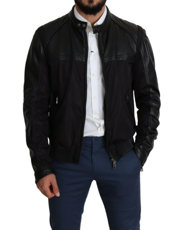 Stunning Dolce & Gabbana Black Bomber Jacket
  Leather details on shoulders and sleeves
  Color: Black
  Full zipper closure
  Logo details
  Made in Italy
  Material: 60% Nylon 40% Leather
  Lining: 90% Nylon 10% Leather
Material: 60% Nylon 40% Leather