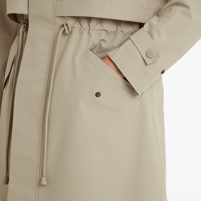When it comes to waterproof jackets, it doesn’t get much more stylish than the Alva. Designed in the classic trench-coat silhouette, the Alva is a great looking coat that also comes with heaps of practical features. Its fully taped seams and waterproof coating ensures you keep the rain out and the warmth in, which is ideal for when the rain pours and the winds blow. Also, to ensure you’re ready for whatever the weather throws at you, the removable and adjustable hood comes complete with drawcords at the opening, while the handy two-way zip provides extra mobility. What’s more, the toggle adjusters on the waist offer that “cinched-in” feel, which is both figure-flattering and great for keeping your torso toasty. With style and substance in abundance, the Alva is your trusty companion for keeping you dry and stylish in the unpredictable British weather.