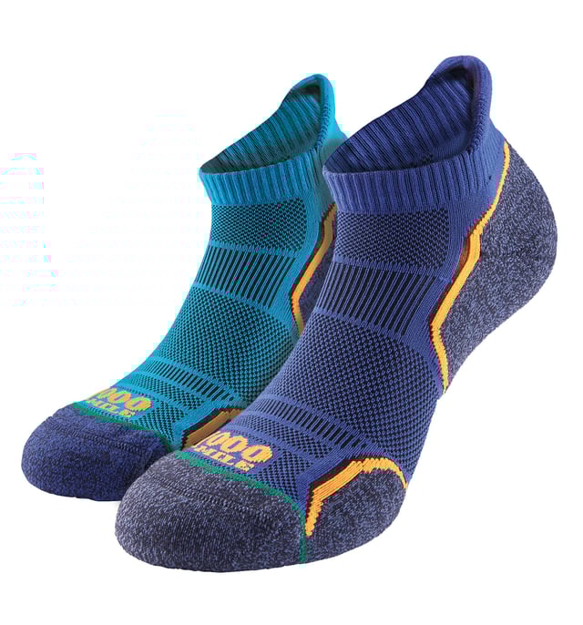 1000 Mile Men's Running SocksIntroducing the men's 1000 Mile Run Socklet, the ultimate companion for your runs. With a focus on protection and support, these socks offer unbeatable comfort. The padded zones on the heel, toes, and ball of the foot provide cushioning and shock absorption, while the extended heel tab safeguards the Achilles tendon. The sock's design incorporates a ventilation mesh on the top, ensuring lightweight feel and enhanced breathability to keep your feet cool. The arch bracing and Y-shaped heel ensure a secure fit, while the flat toe seam reduces irritation. Ideal for running, gym workouts, sports, and daily wear. Available in three size: Medium – 6-8.5UK (EUR 39-42.5), Large – 9-11.1UK (EUR 43-46.5), XL – 12-14UK (EUR 47-49). Each TWIN PACK includes one pair of Kingfisher blue and one pair of navy socks, so you can enjoy variety.Extra Product DetailsUnbeatable comfort with padded zones for cushioning and shock absorption.Protection for Achilles tendon with extended heel tab.Lightweight and breathable with ventilation mesh design.Secure fit with arch bracing and Y-shaped heel.Reduced irritation with flat toe seam.Versatile for running, workouts, sports, and daily wear.Twin pack with variety: Kingfisher blue and navy socks.Available in three sizes for perfect fit: Medium, Large, and XL.