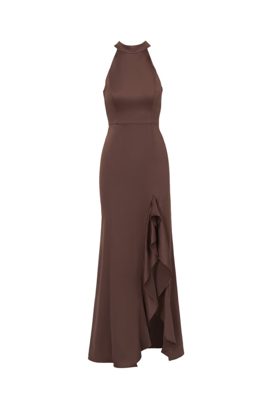 Fall for dreamy fabric and details when you select this satin mermaid gown for your next occasion. This formal dress features a sleeveless halter bodice, mock neckline, and a mermaid skirt with a slit trimmed with ruffles. Designed with satin fabric, the bodice of this formal dress has princess seams for a fit that flatters your figure. A self-tie neck adorns the cutout back and a hidden zipper closure at the centre back completes this evening gown. Paired with statement jewellery and metallic heels, this sleeveless satin gown will shine for formal and black-tie events.