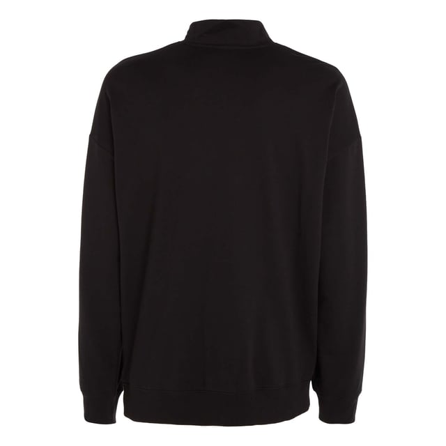 Mens Calvin Klein Lounge Sweatshirt in black.- Ribbed crewneck.- Ribbed cuffs and hem.- Signature tape inside the neckline.- Calvin Klein embroidery on the chest.- Regular fit.- Ref: 000NM2299EUB1