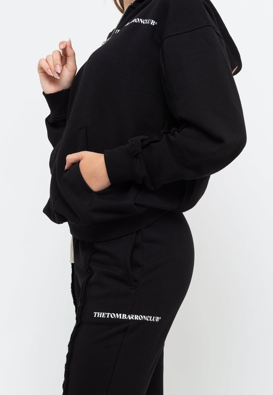 Tom Barron Dames trainingspak met kwart rits en logo in oversize