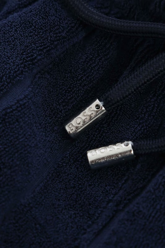 Boss Terry Shorts Navy
Terry is back this season and a must-have for the warmer season. These shorts are comfy, light and detailed with metal hardware and iconic BOSS taping. Great for holidaying and spending time at the poolside or beach!

Cotton Terry
Metal Branding
Style - 50508828 
