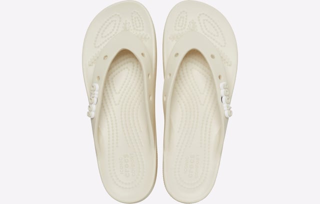Meet the platform edition of the Classic Crocs flip-flop. Playfully elevate any look: These platform sandals bring style to any look while maintaining a relaxed, comfortable fit. They're perfect for lounging by the pool or getting dinner downtown.
-Classic flip design with added height.
-Day long comfort from the soft footbed and upper.
-Easy to clean.