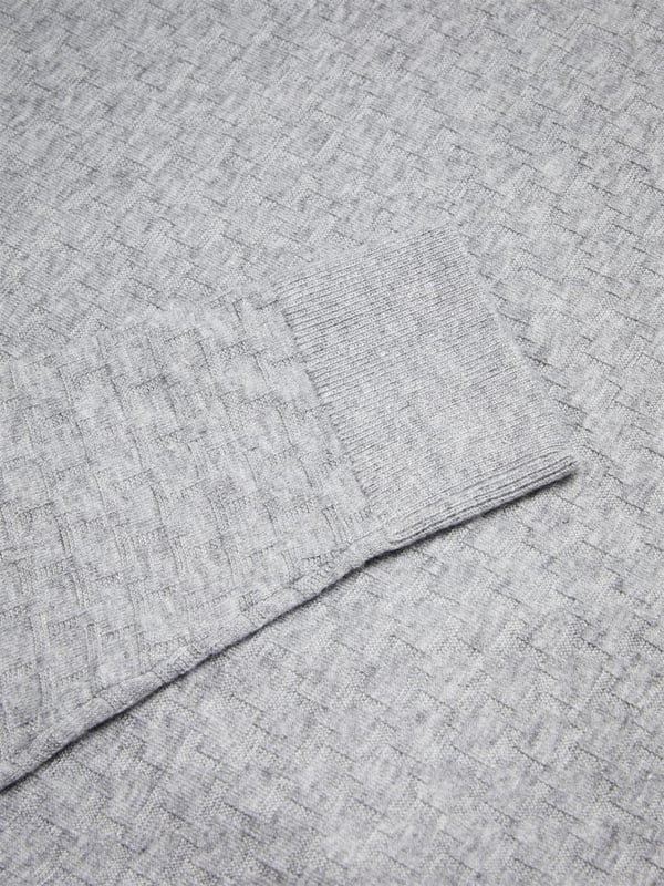 <span style="color: rgb(48, 55, 62); font-family: "IBM Plex Sans", sans-serif; font-size: 14px; white-space-collapse: preserve;">Unmatched in versatility and enduring in style, The Morar Polo is an essential in any wardrobe, effortlessly combining comfort and sophistication. Whether dressing up for a weekend affair or striving for a laid-back yet polished appearance, this polo offers the perfect solution. Boasting a timeless design with its long sleeves, diamond T stitch and classic collar, this knitted shirt is crafted from a luxurious wool blend and fastened with buttons.</span>
