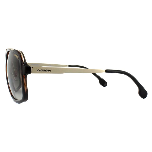 Las gafas de sol Carrera 1004/s 2ik ha Havana Gold Brown Gradient son un estilo clásico de Carrera con la forma de mosca retro cuadrada y detalles tallados en el puente. Las finas patillas metálicas hacen juego con los detalles del puente para una combinación ganadora de metal y plástico.