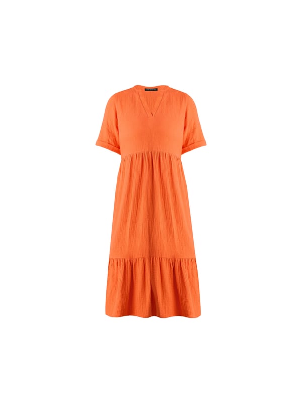 In a beautiful burnt orange, this dress is cut from a textured cotton thats so comfortable to wear. With a nehru collar and lengthening V-neck, it has a tiered design thats flattering and easy to wear. Short sleeves and side seam pockets add extra detail, making it the perfect throw-on summer dress.