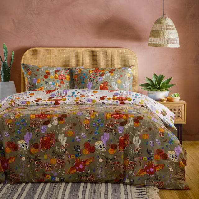 Inspired by Dia de los muertos, or ‘Day of the Dead’, the La Vida duvet cover features hand-drawn symbols of bright marigolds, dancing skeletons, and flaming hearts bursting off a tranquil sage base. This duvet cover set offers an off-white reverse to brighten your bedroom all year round; it truly is a celebration of life!
