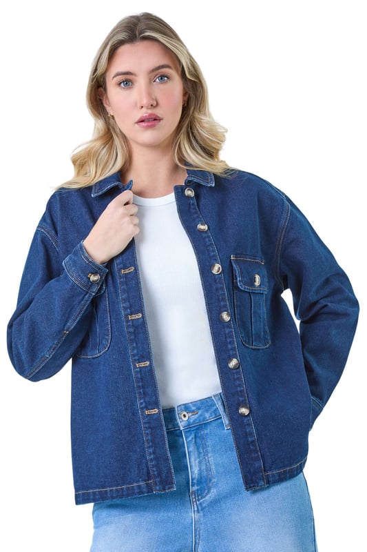 Relaxed Denim Jacket from Roman. Step out in style this Summer with this relaxed denim jacket, featuring a classic button-through front, charming button cuff details, and horn buttons adding a touch of elegance. Complete with a sleek collar, this piece is the epitome of casual sophistication. Pair it effortlessly with your favourite summer ensemble for a versatile and chic look that exudes laid-back charm all season long.