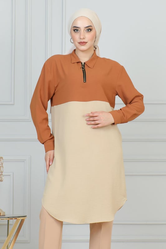 Stoffmerkmal: Hergestellt aus Belmando-Stoff.Produktmerkmal: Neues Hijab-Modemodell der Saison. Ungefüttert. Hat einen halben Reißverschluss vorne für einfache Verwendung. Manschettenknöpfe sind funktional. Aufgrund von Konzeptaufnahmen kann es leichte Farbabweichungen im Produkt geben. Das Model trägt Größe 40. Größe 38 Tunika-Maße: Produktlänge: 99 cm - Br