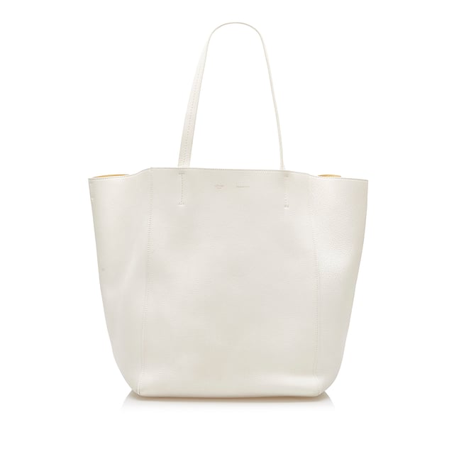 VINTAGE. RRP AS NEW. The Cabas Tote features a leather body, flat leather straps, an open top, and an interior zip pocket.Exterior back is discolored and stained. Exterior bottom is discolored and stained. Exterior corners is discolored and stained. Exterior front is discolored and stained. Exterior handle is discolored. Exterior side is discolored and stained. Interior lining is discolored and stained. Interior pocket is discolored and stained.

Dimensions:
Length 33cm
Width 50cm
Depth 17cm
Shoulder Drop 22cm

Original Accessories: Pouch

Color: White
Material: Leather x Calf
Country of Origin: France
Boutique Reference: SSU94347K1342


Product Rating: GoodCondition