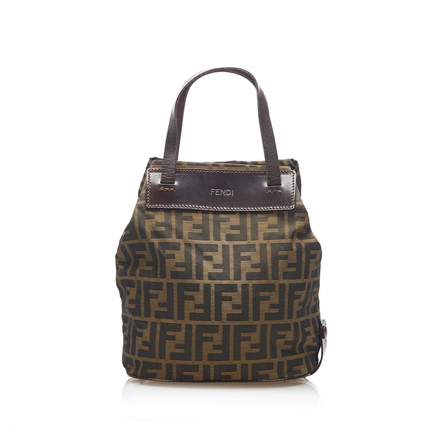 VINTAGE. RRP AS NEW. This handbag features a canvas body with leather trim, flat leather handles, a magnetic snap closure, and an interior zip pocket.Exterior back is discolored and scratched. Exterior bottom is discolored. Exterior corners is discolored. Exterior front is discolored and scratched. Exterior handle is discolored. Exterior side is discolored.

Dimensions:
Length 22.5cm
Width 30.5cm
Depth 11.5cm
Hand Drop 12cm
Shoulder Drop 10cm

Original Accessories: This item has no other original accessories.

Color: Brown x Dark Brown x Black
Material: Fabric x Canvas x Leather x Calf
Country of Origin: Italy
Boutique Reference: SSU96243K1342


Product Rating: GoodCondition