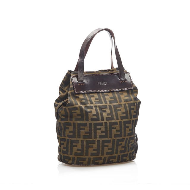 VINTAGE. RRP AS NEW. This handbag features a canvas body with leather trim, flat leather handles, a magnetic snap closure, and an interior zip pocket.Exterior back is discolored and scratched. Exterior bottom is discolored. Exterior corners is discolored. Exterior front is discolored and scratched. Exterior handle is discolored. Exterior side is discolored.

Dimensions:
Length 22.5cm
Width 30.5cm
Depth 11.5cm
Hand Drop 12cm
Shoulder Drop 10cm

Original Accessories: This item has no other original accessories.

Color: Brown x Dark Brown x Black
Material: Fabric x Canvas x Leather x Calf
Country of Origin: Italy
Boutique Reference: SSU96243K1342


Product Rating: GoodCondition