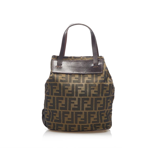 VINTAGE. RRP AS NEW. This handbag features a canvas body with leather trim, flat leather handles, a magnetic snap closure, and an interior zip pocket.Exterior back is discolored and scratched. Exterior bottom is discolored. Exterior corners is discolored. Exterior front is discolored and scratched. Exterior handle is discolored. Exterior side is discolored.

Dimensions:
Length 22.5cm
Width 30.5cm
Depth 11.5cm
Hand Drop 12cm
Shoulder Drop 10cm

Original Accessories: This item has no other original accessories.

Color: Brown x Dark Brown x Black
Material: Fabric x Canvas x Leather x Calf
Country of Origin: Italy
Boutique Reference: SSU96243K1342


Product Rating: GoodCondition