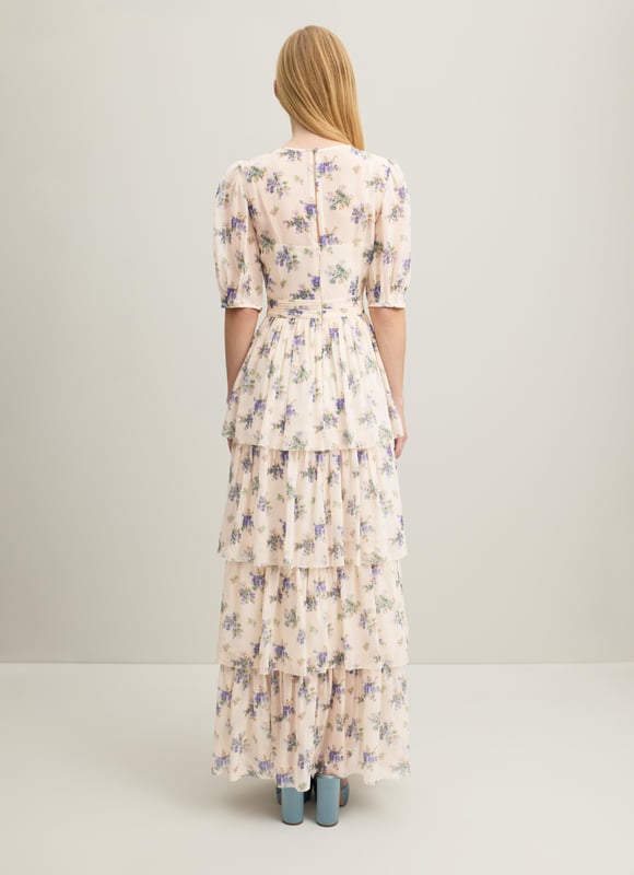 Floaty and fluttery, the new Bouvier dress in our Royal Ascot collection, has also been made to our Perfectly Petite* proportions. A real beauty of a dress, it'll turn heads at every opportunity. It's crafted from slightly-sheer luxurious silk with a cream and blue bouquet print, which is a reimagition of a French mid 19th century design. It has a slip layer, a round neck with pleat detail, short sleeves with pleated cuffs, a cummerbund belt, and a ruffle tiered maxi skirt. Frothy and fun, wear her with towering heels and chic clutch bag. 

*Perfectly Petite
Our Perfectly Petite range is crafted for a flattering fit on those 5’3” and below. Not simply graded down, our petite collection is caully measured to ensure the perfect fit across every piece of clothing. Dress confidently in love-forever, investment pieces made with you in mind and bring the extraordiry to the ordiry, everyday.