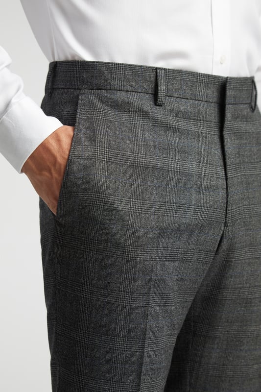 Slim Fit Pow Check Trousers The perfect pairing for the slim fit Sagan suit jacket, or for mixing and matching with other smart-casual favourites, the slim fit Sagan suit trousers from Ted Baker are your next must-have.Crafted in a luxuriously soft wool blend, with a charcoal blue pow check, these smart suit trousers are suited to every occasion.