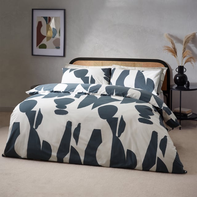 Enjoy a restful night’s sleep in the timeless Meta duvet cover set. Inspired by modern, minimalist and abstract art, it features fluid marks and angular shapes, fused together on a warm, relaxing neutral background. The reverse is identical to the front and is printed onto soft, cotton rich fabric for a comfortable night’s rest. Choose between the dusk colourway, which is a modern alternative to monochrome, or the multi-coloured design which adds a pop of colour to neutral, modern and stylish surroundings. This product is certified by OEKO-TEX® showing it has been sustainably made.