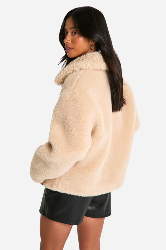 Keep toasty this season with our collection of petite coats and jackets. From petite trench coats to petite teddy coats, our coats for petite women are specifically designed to fit all you girls sitting pretty at 5'3'' and under. Step out in a petite blazer or pass the vibe check in a petite puffer jacket. Whatever your style, we've got you, girl. This one would look dreamy with a pair of straight leg jeans, an oversized hoodie and chunky trainers.Style: Teddy CoatLength: RegularSleeve Length: Long Sleeve