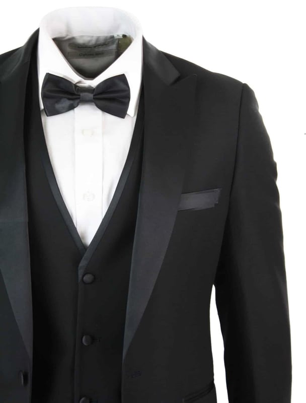 Join the ranks of the well dressed with a little help from Paul Andrew's Regent Suit. A stunning black Tuxedo. while full lining ensures an easy glide over shirts or knitwear.Offset the suit with a crisp white shirt and complete the look with one of Paul Andrew's Black Bow Ties.