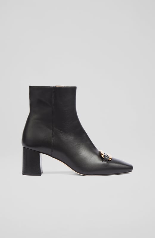 LK Bennett Novella Ankle Boots,Black A chic leather ankle boot with a bit of detail, our new Novella boots can elevate the everyday when you need them too. Crafted in Spain from beautiful black smooth calf leather, they have an almond-shaped toe, a gold bar embellishment with LKB logo detail, an inside zip and a leather-wrapped 60mm block heel. Wear them with tailoring, dresses or jeans - Novella can do it all.