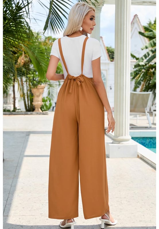 High Rise Wide Leg Suspender Pants
  Quality materials
  Flattering high-rise waist
  Sophisticated wide leg design
  Unique and trendy suspenders
  Versatile for any occasion
  Elevate your fashion game