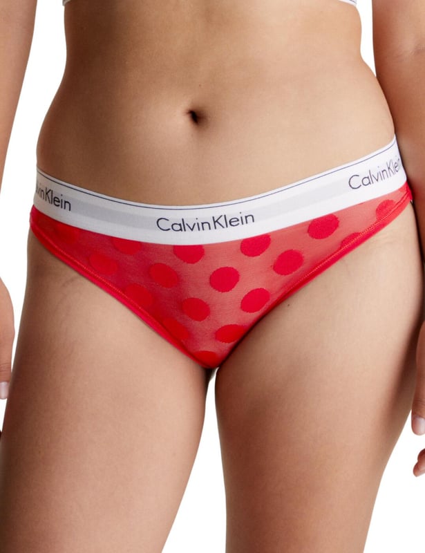 Enjoy the modern sophistication of Calvin Klein's Modern Cotton briefs. Created with a laser burnout technique for an all-over polka dot texture, these briefs offer a modern and fashionable style without compromising on comfort. The semi-sheer mesh with cheeky rear coverage is the perfect combination of seduction and sophistication. Designed with a low rise waist and Calvin Klein's signature elastic waistband, you can easily find the perfect fit. The matching coordinates available within the Calvin Klein Modern Cotton collection let you complete the look and enjoy a fashionable and confident style.

Calvin Klein logo stretch waistband
Polka dot print
Semi-sheer mesh
Cheeky rear coverage
Low-rise waist
Matching coordinates available
Country of origin: Sri Lanka
Composition: 87% Nylon | 13% Elastane
Listed in UK sizes