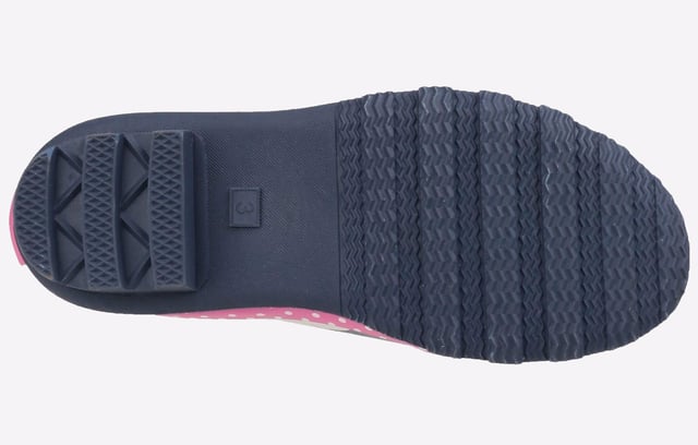Perfect for the upcoming months, these Cotswold Dotty wellingtons are perfect for taking the rainy weather in stride and making a splash. The waterproof rubber upper is constructed in a classic wellington silhouette, with a deep navy colourway adorned with fun multi-coloured dots and a chic pink trim sure to brighten up your little ones day no matter what the weather. The slip-on design ensures easy on / off wear, with an adjustable buckle feature to the side for the perfect fit and feel. A soft textile lining and padded footbed provide comfort, with a durable rubber outsole and cleated heel for enhanced traction, making them a wardrobe essential for the upcoming months. 
 - Waterproof rubber outsole
 - Adjustable buckle feature
 - Textile lined with removable insole
 - Cushioned footbed
 - Slip on design
 - Rubber traction sole unit with chunky cleated heel
 - Cotswold branding
 *Do your bit for the environment as every pair of these Cotswold Shoes sold supports National Forest tree planting.*
 Please note: These boots come in a branded Cotswold bag and are not boxed.