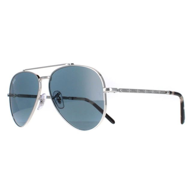 Ray-Ban Aviator Unisex Polished Silver Blue RB3625 New Aviator  Sunglasses are a fusion of classic design and modern innovation. With a nod to the iconic aviator silhouette, these sunglasses feature a sleek metal frame and bold double bridge, delivering a contemporary twist on a beloved style. The updated, slightly squared lenses offer a fresh take on the traditional aviator shape, exuding confidence and sophistication. Crafted with precision and attention to detail, these sunglasses not only make a fashion statement but also provide exceptional UV protection, ensuring both style and eye safety.