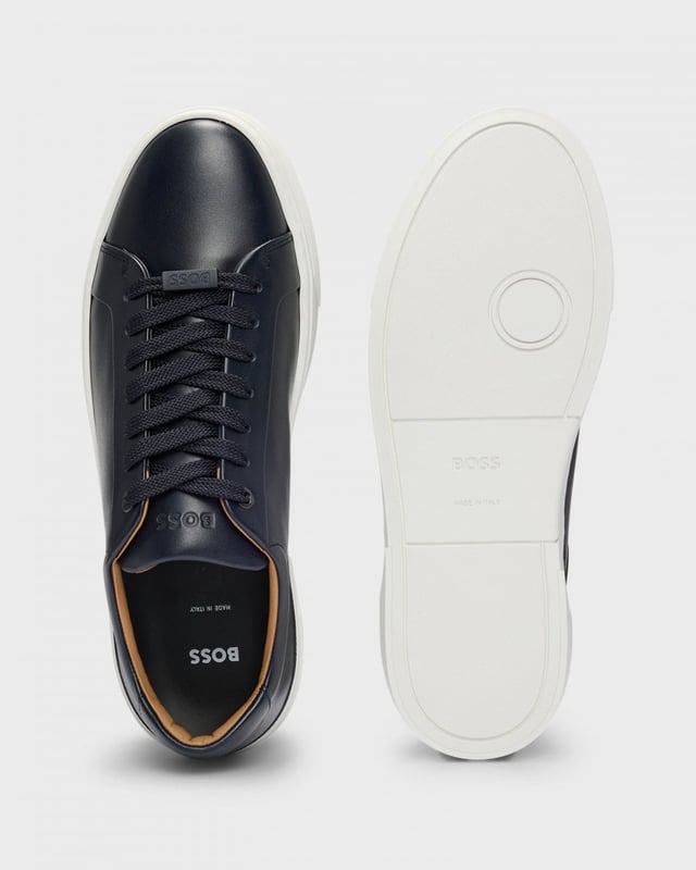 Elevated Italian-made trainers by BOSS. Featuring a branded lace loop and signature eyelets, this low-top pair is crafted in smooth leather.

Laces
Fully lined
Packaging: Box

100% Yak, 100% Cow skin, 60% Polyester, 40% Polyurethane, Sole: 100% Rubber, Upper material: 100% Cow skin, Innersole: 100% Calfskin
 
50536841
 