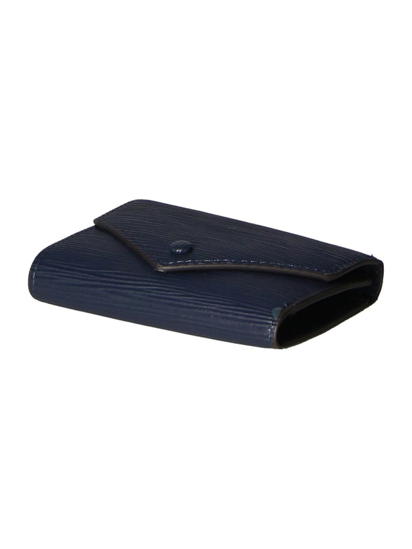 Cartera de mujer en auténtica piel de madrás. Producto artesanal.