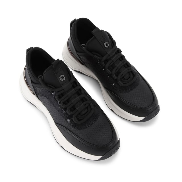 This Swift Runner trainer features a black snake embossed upper with lace up front. There is a gunmetal Icon C stud on the tongue tab and a matching gunmetal panel at the heel.