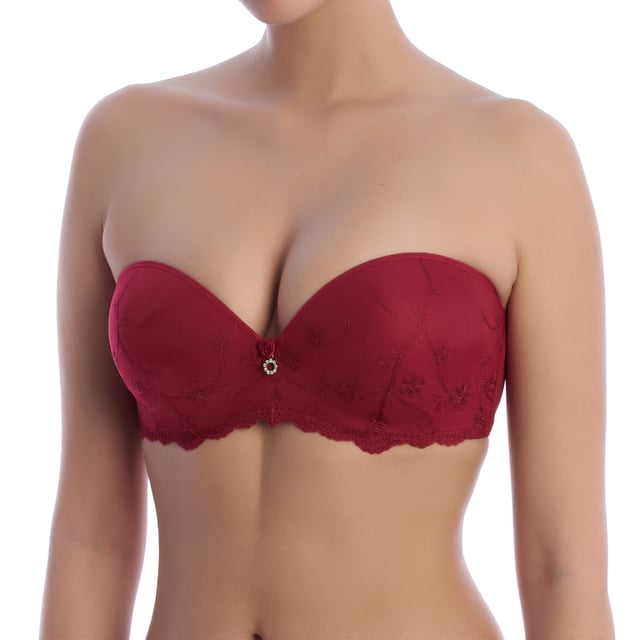 Sujetador sin tirantes para novias, diseñado con aros y copas con relleno "push-up". Perfecto para realzar el busto y complementar vestidos de novia y de fiesta, combinando comodidad y sofisticación.

Detalles:

- Diseño sin tirantes.
- Copas con relleno "push-up" y aros.
- Tul bordado y detalles refinados.
- Incluye juego de tirantes textiles.
- Cierre trasero ajustable.

Este sujetador sin tirantes para novias combina funcionalidad y estilo con un diseño sin tirantes, ideal para realzar la belleza de cualquier vestido nupcial o de fiesta. Sus detalles bordados y su construcción cómoda lo convierten en una opción imprescindible para el día más especial.
 Composición: 82% Poliester, 15% Poliamida, 3% Elastano
 Cuidados:
Lavar en máquina hasta 30ºC.
No usar blanqueadores.
No usar secadora.