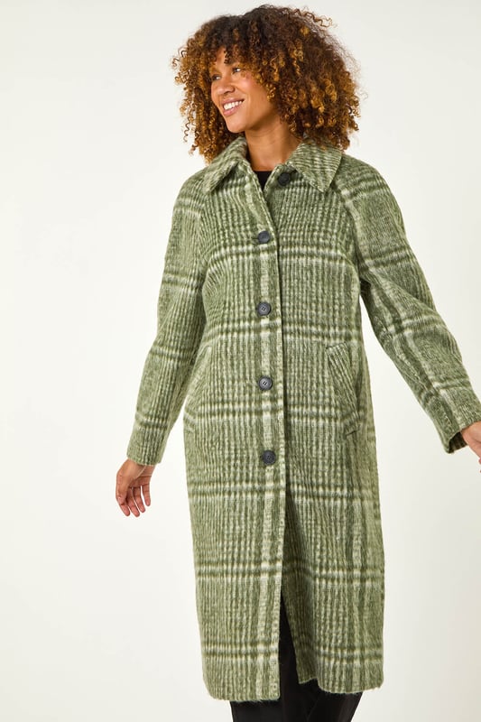Brush Check But Coat from Roman. Wrap up in style this Autumn Winter with our trendy brushed check print coat. The front button opening adds a classic touch, while the side welt pockets are both practical and stylish. Designed with a collar and rever style, this coat features long raglan sleeves for a comfortable fit. Crafted from a comfortable woven fabric and fully lined for extra warmth, this coat is versatile and on-trend. Perfect for layering throughout the seasons, pair with trousers and boots for a smart style statement.