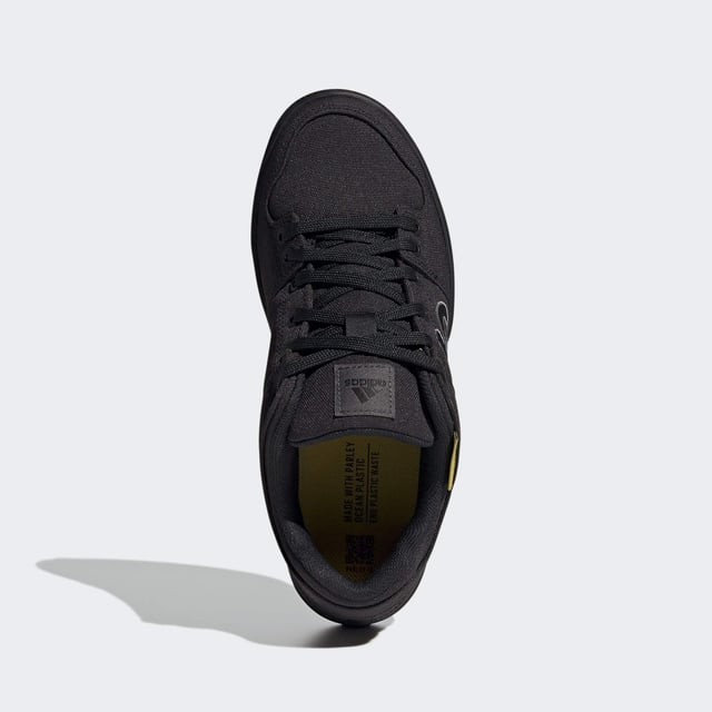 Hit the trail. Ride to work. Hang out. The adidas Five Ten Freerider Canvas Mountain Bike Shoes are as street friendly as they are capable on the bike. A Dotty tread with Stealth® S1™ rubber sets you up for flat pedal control and bike-worthy durability sets you up for the trail. All with a fit and feel that sets the bar for versatile wear on and off the bike.  - Regular fit - Lace closure - Canvas upper - Textile lining - Reinforced toe - Stealth® S1 rubber outsole - Yarn in upper contains at least 50% Parley Ocean Plastic  and 50% recycled polyester  Shipped by adidas