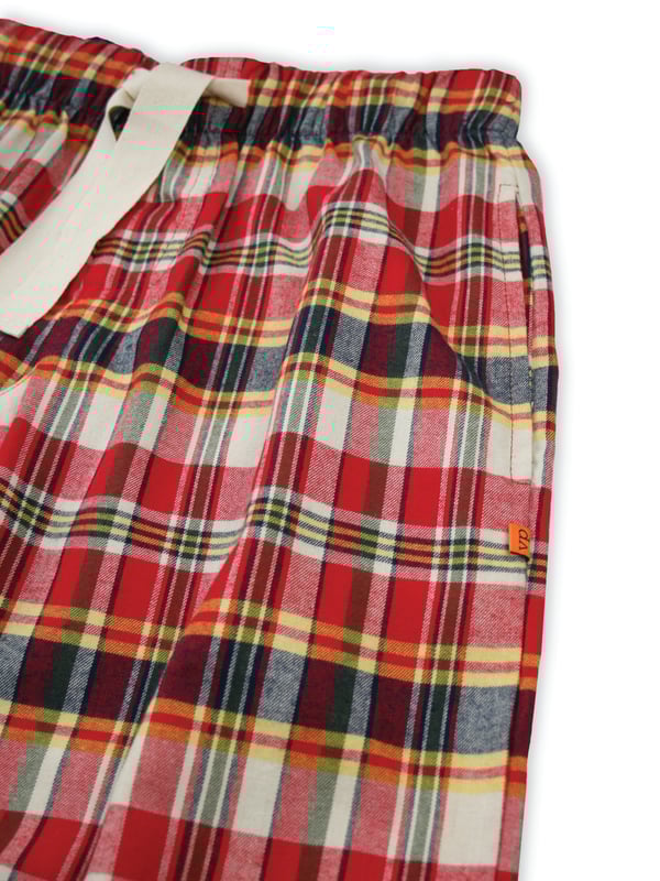 Red / Beige / Navy Brushed check unisex lounge pants by Vanilla Park
There’s nothing cosier than check nightwear in the winter. Our Pentlow pyjama trousers are made from brushed 100% cotton for a comfy, warm feel and are trimmed with navy cotton. Fully elasticated at the waist, with an adjustable front drawstring the trousers have two side pockets. Wear it with a jersey T-shirt for the perfect way to lounge or sleep when temperatures tumble.
100% Cotton
Machine Washable
Super soft luxury brushed cotton fabric
Comfortable jersey inner waistband
Unisex.