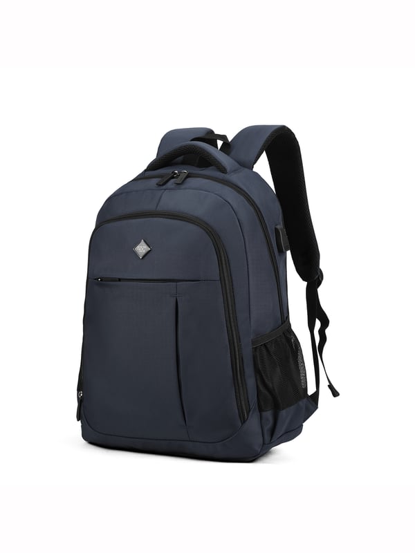 Mochila unisex. El cierre es con cremallera. Los bolsillos internos son uno abierto. Hay tres bolsillos externos con cremallera y dos laterales abiertos. Falta la correa para el hombro. El asa es de tela. Hay un compartimento interno. El material exterior es poliéster. Internamente está forrado en poliéster. Medidas: 49x37x17 cm. Producto de moda