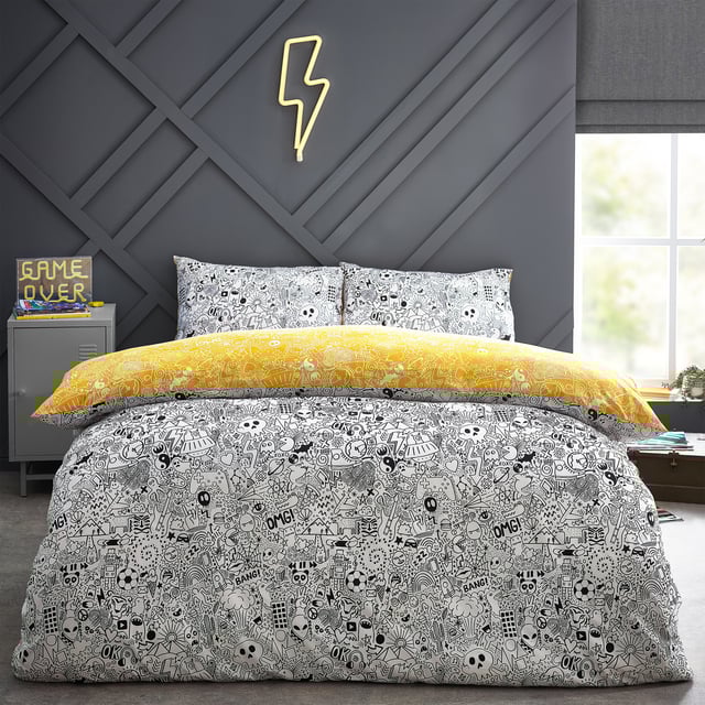 Express your creativity with this doodle duvet set. Featuring exciting notebook doodles of aliens, monsters, and spaceships. The excitement continues to the reverse a coordinating design on a yellow base so you can switch the look when you need to.